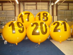 buy giant balloons for business promotions. yellow color helium advertising balloons