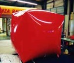 giant red color cube shape helium advertising balloon.